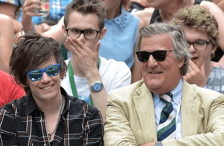 Elliott Spencer with his partner Stephen Fry chilling